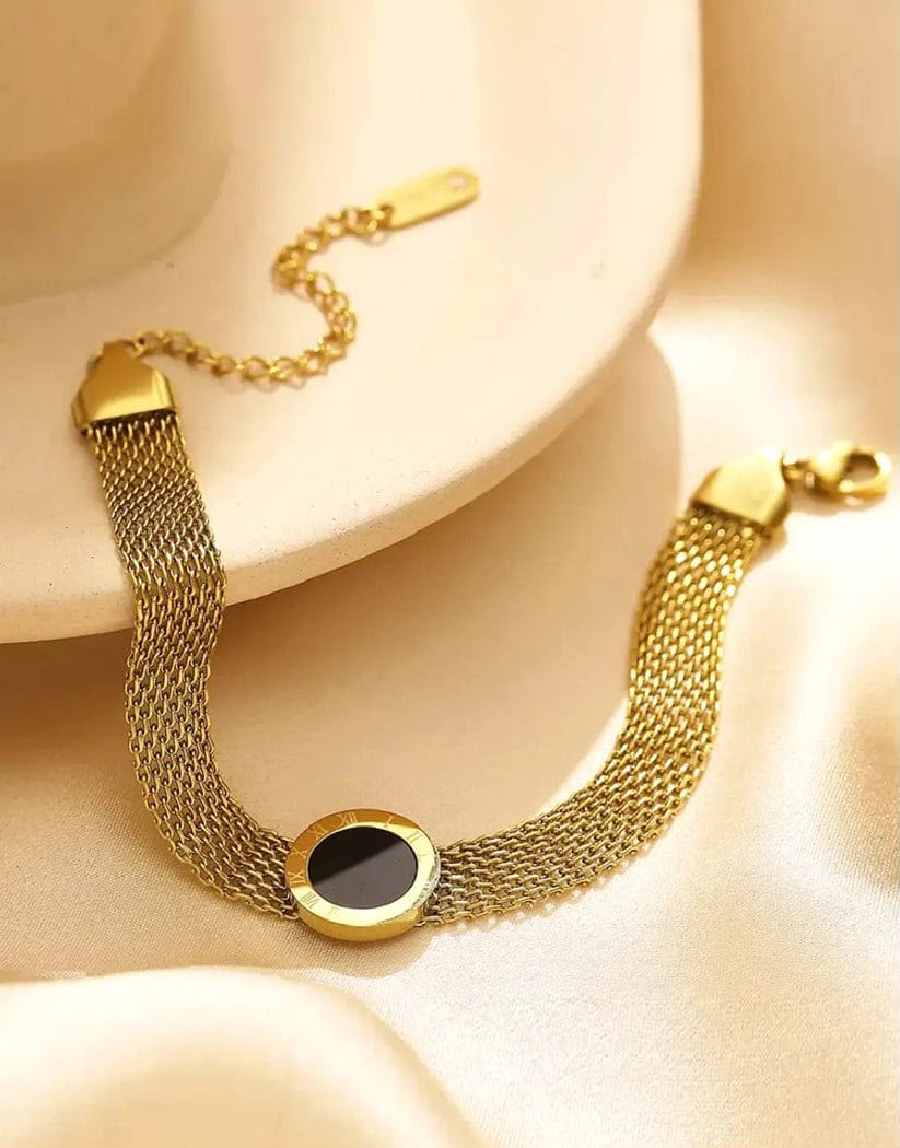 `gold mesh chain bracelet with black medallion charm `gold mesh chain bracelet with black medallion charm