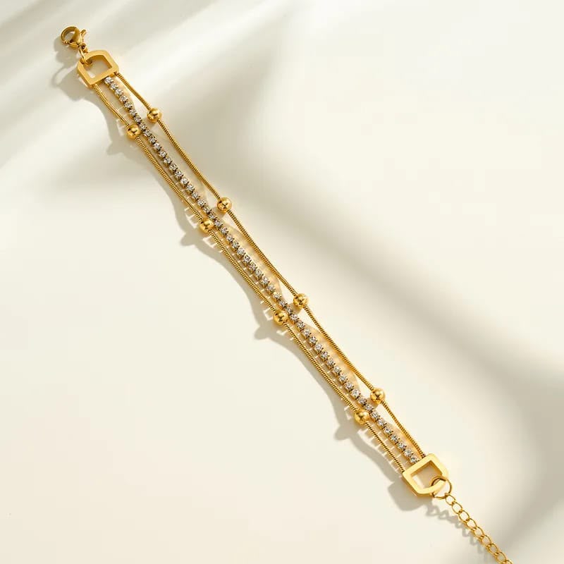 layered gold chain bracelet with crystal strand layered gold chain bracelet with crystal strand