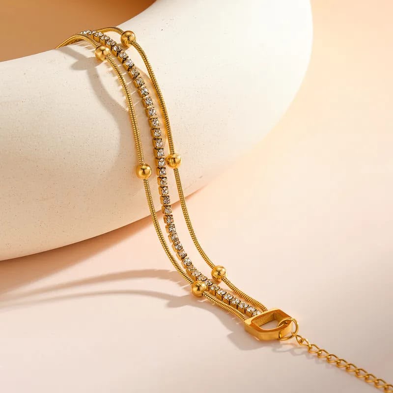 layered gold chain bracelet with crystal strand layered gold chain bracelet with crystal strand