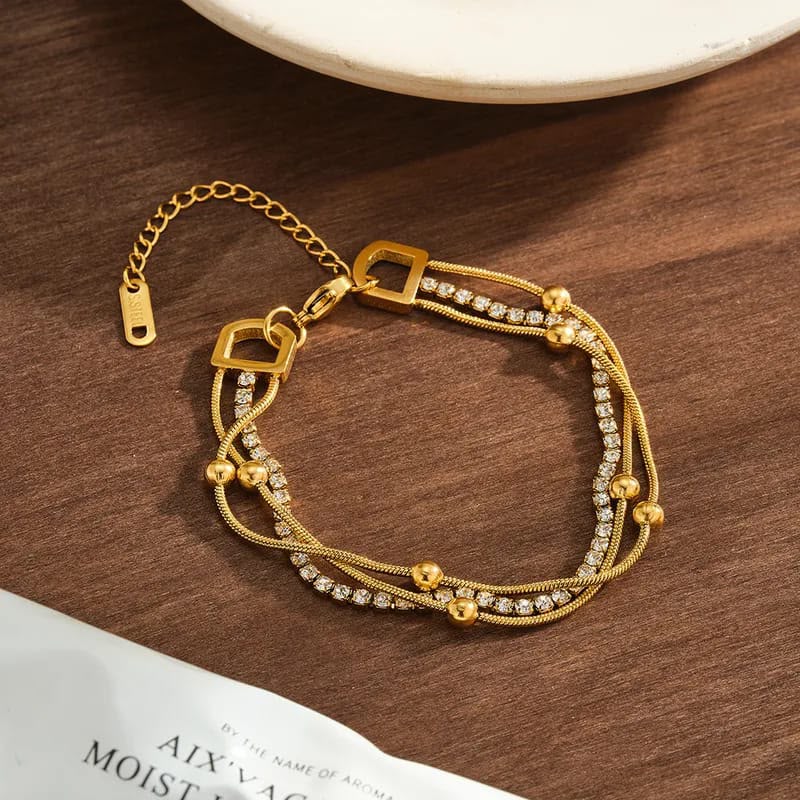 layered gold chain bracelet with crystal strand layered gold chain bracelet with crystal strand