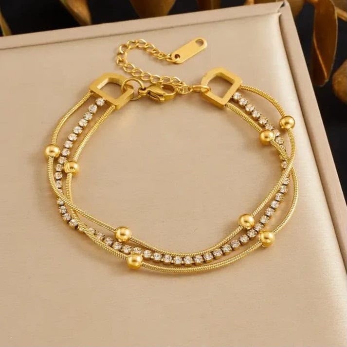 layered gold chain bracelet with crystal strand layered gold chain bracelet with crystal strand