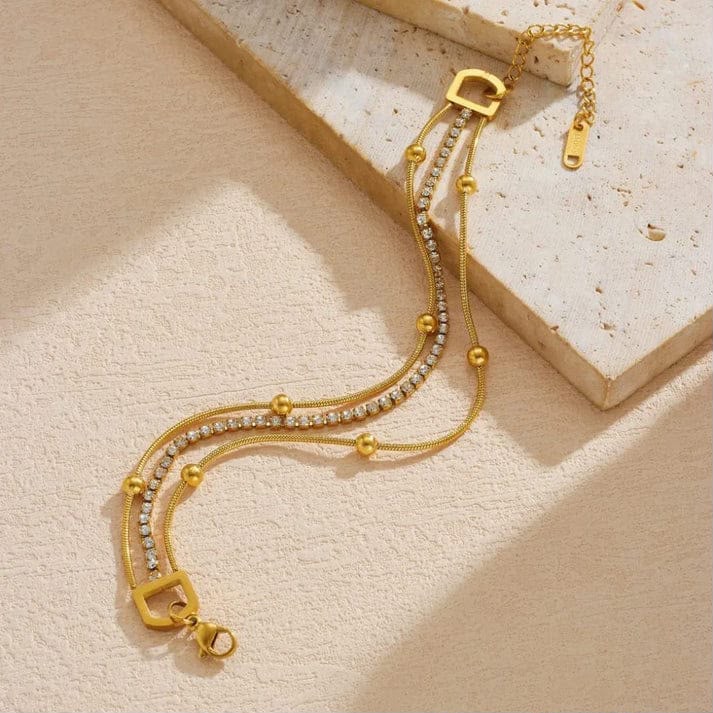 layered gold chain bracelet with crystal strand layered gold chain bracelet with crystal strand